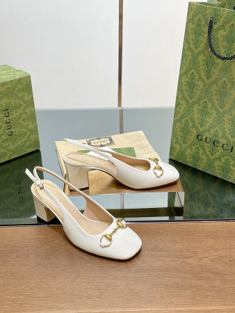 ua G*u*i women's horsebit slingback