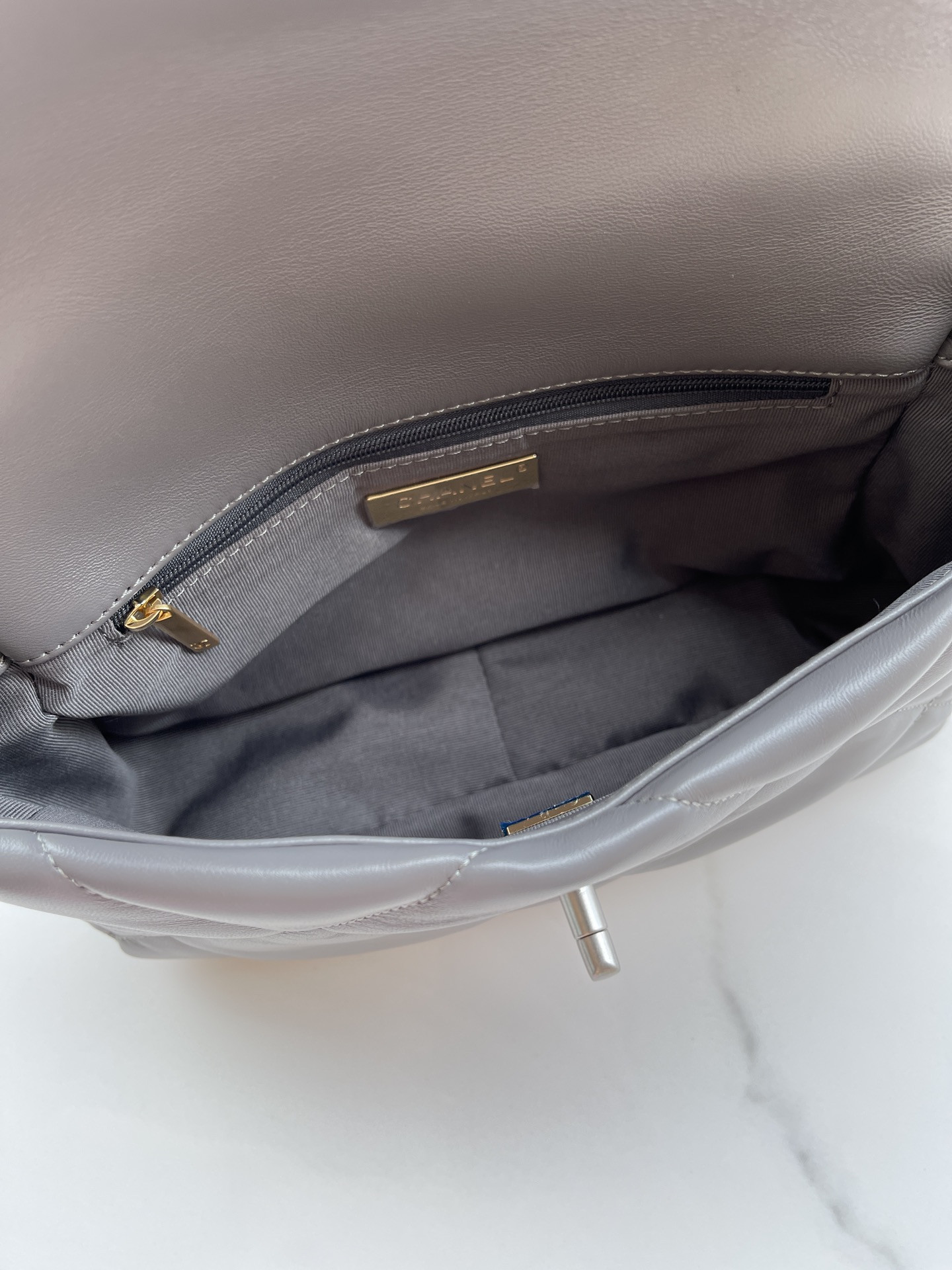 Ch*el 19 handbag shiny leather, gold-tone, silver-tone & ruthenium-finish metal dark gray 6.2 × 10.1 × 3.5 in