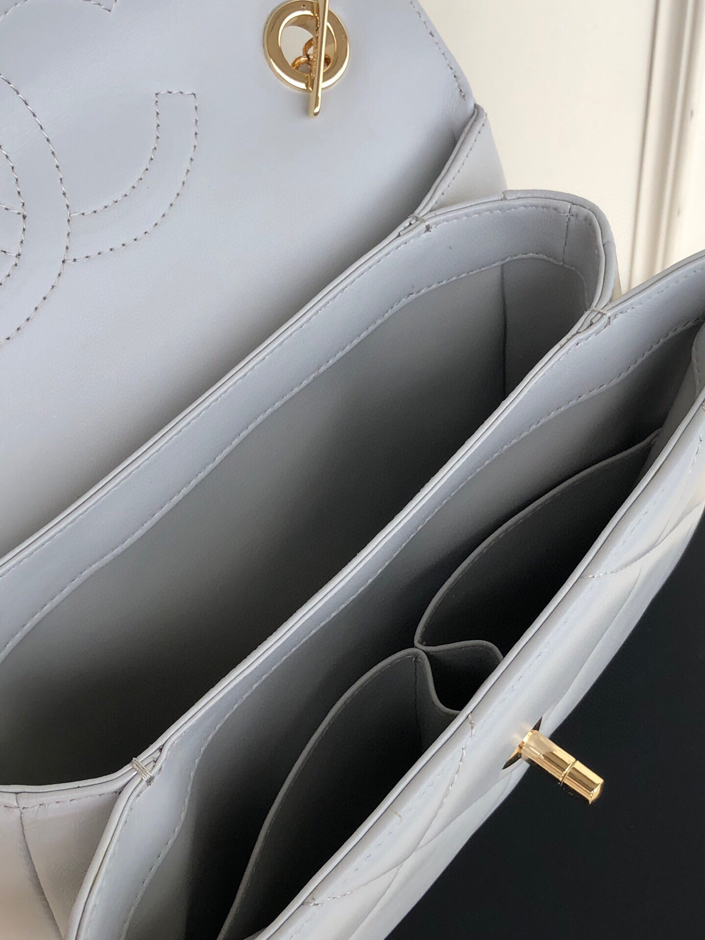 Ch*el flap bag with top handle 6.6 × 9.8 × 4.7 in