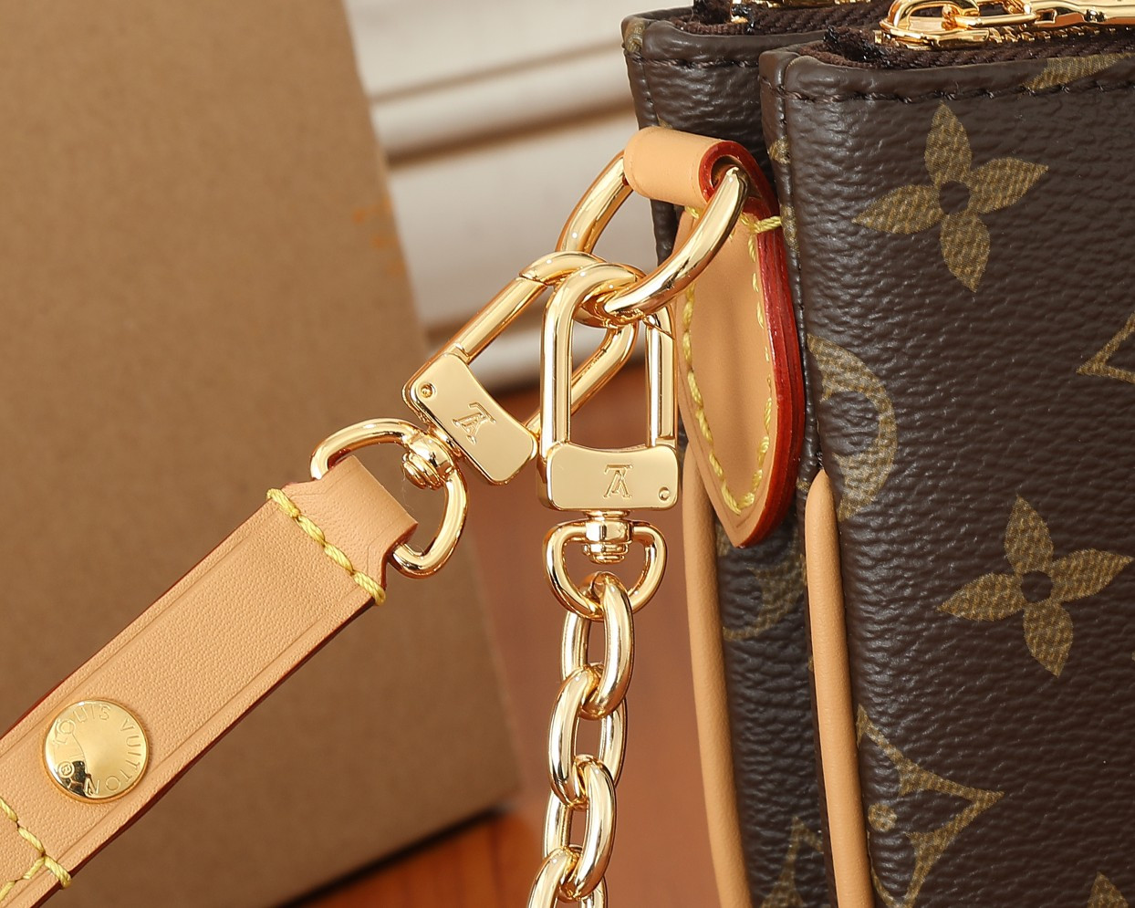 LV  Liv Pochette  M83008 9.6 x 5.3 x 2.6 inches