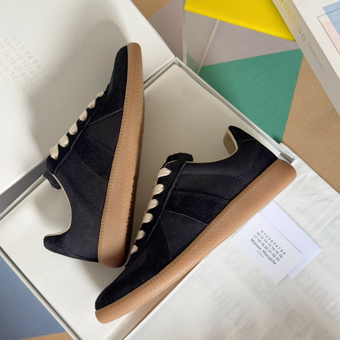 ua ma*s*n Ma*i*la mm6 sneakers