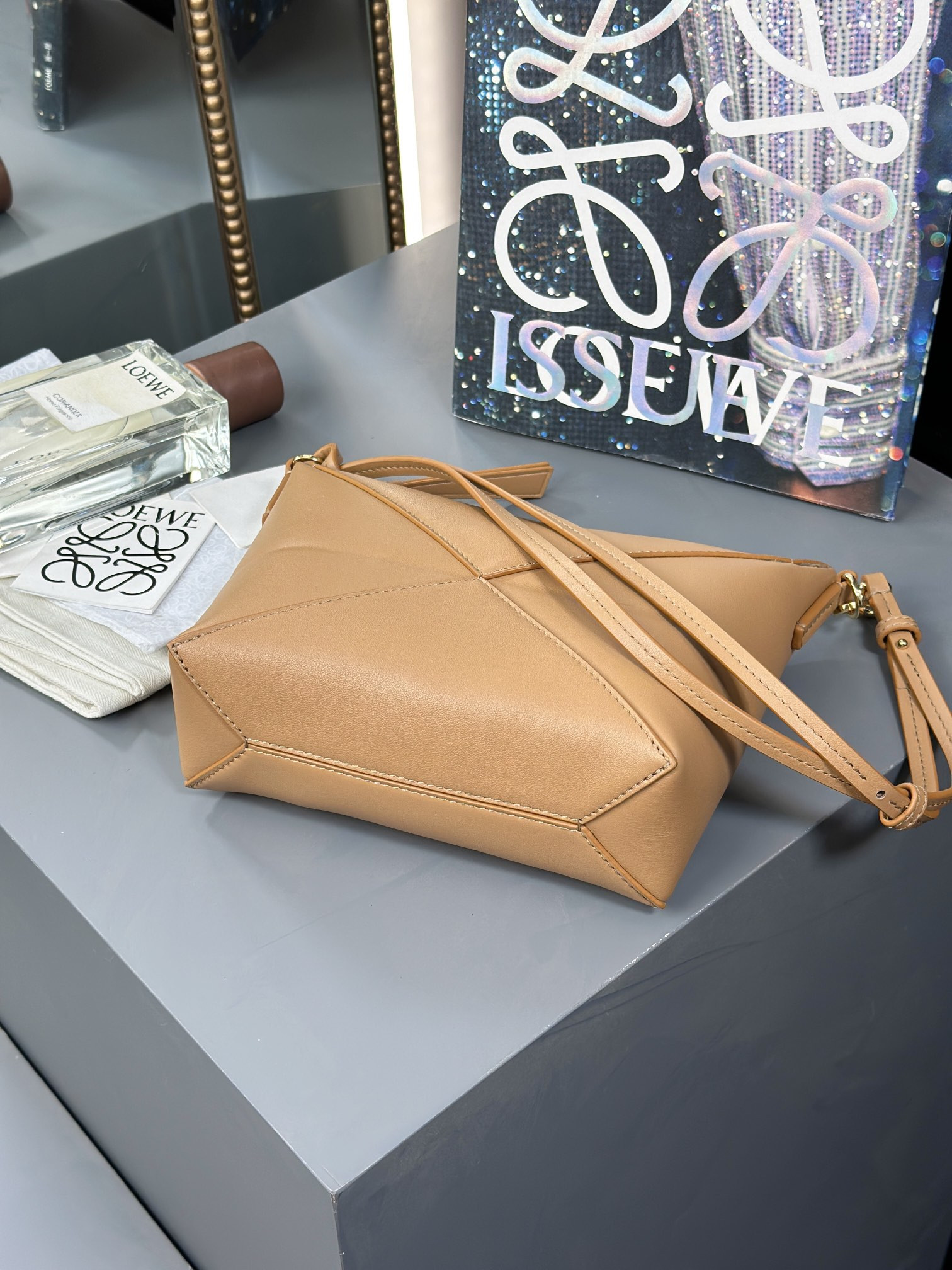 L0ew* puzzle fold pouch in shiny nappa calfskin 15.5x23x6.5cm